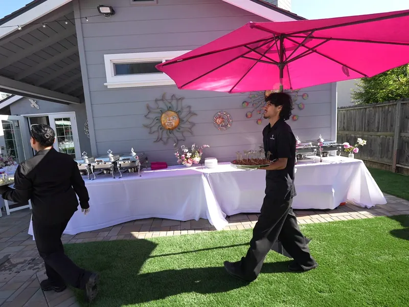 Backyard buffet being set up before a Half Moon Bay dinner
