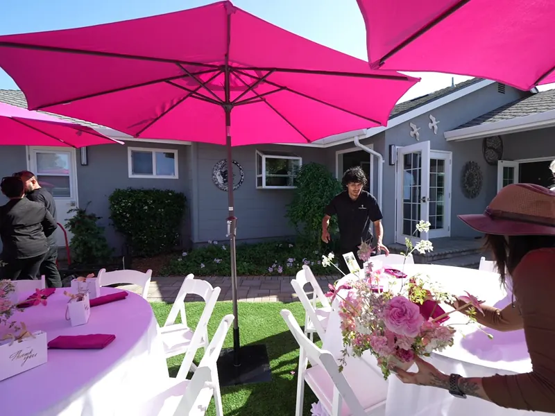 Bouquet carried across the lawn at a Redwood City backyard party