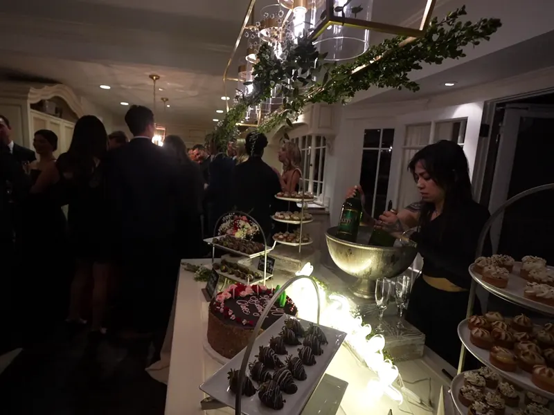 Guests at a dessert buffet during a Hillsborough evening reception