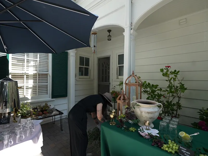 Beverage station on a covered porch, sheltered from Pacifica coastal wind