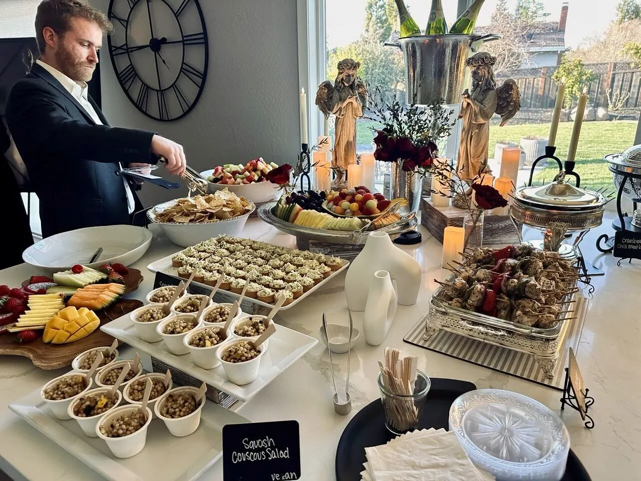 Elegant indoor buffet with hot entrees, seasonal sides and salads set for a San Mateo event by San Mateo Catering Company
