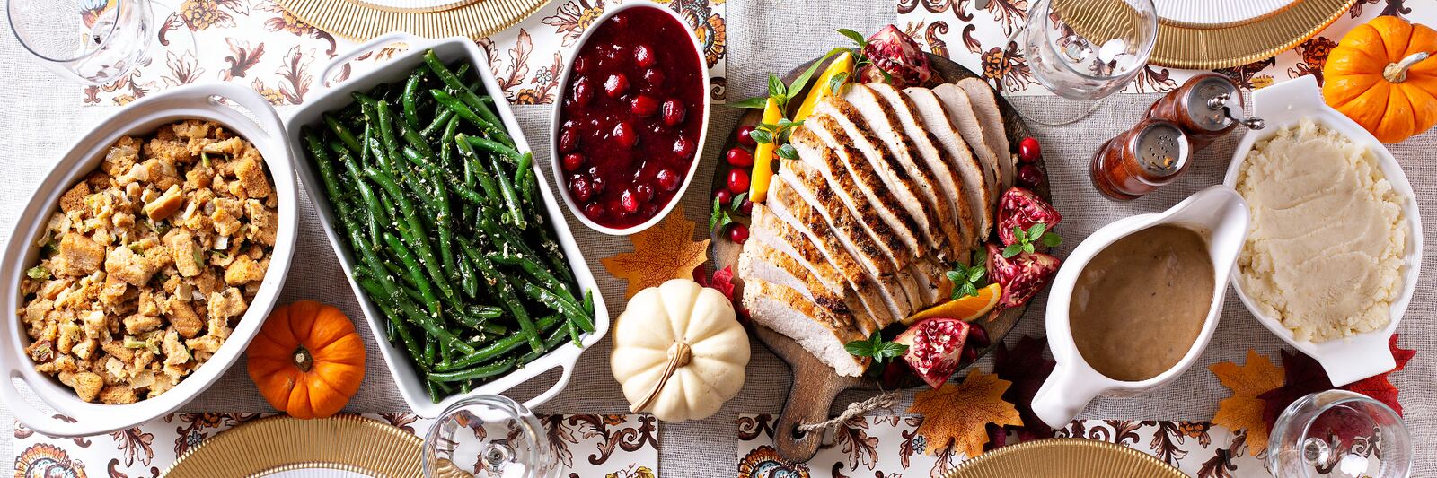 Herb-roasted holiday turkey with rosemary and cranberries carved for holiday catering in San Mateo and Burlingame